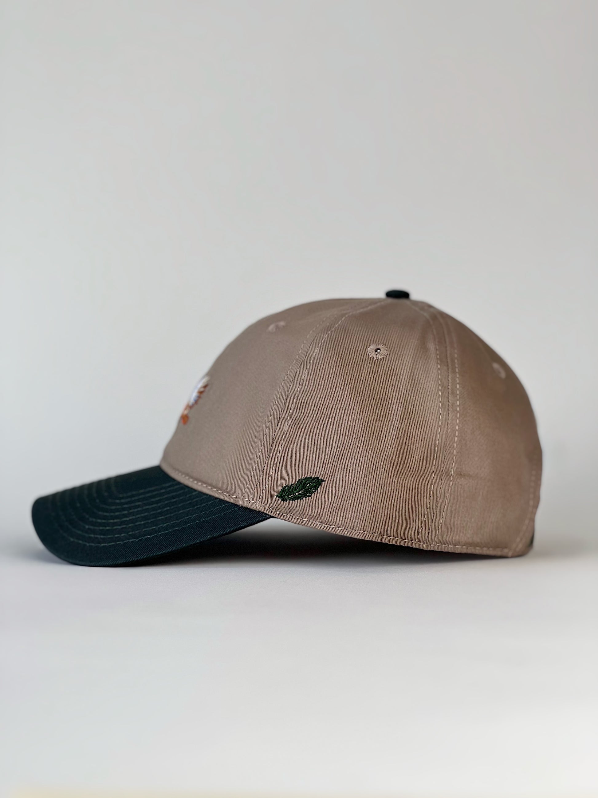Mallard and Friends Khaki and Dark Green 6 Panel Dad Hat Side View With Leaf